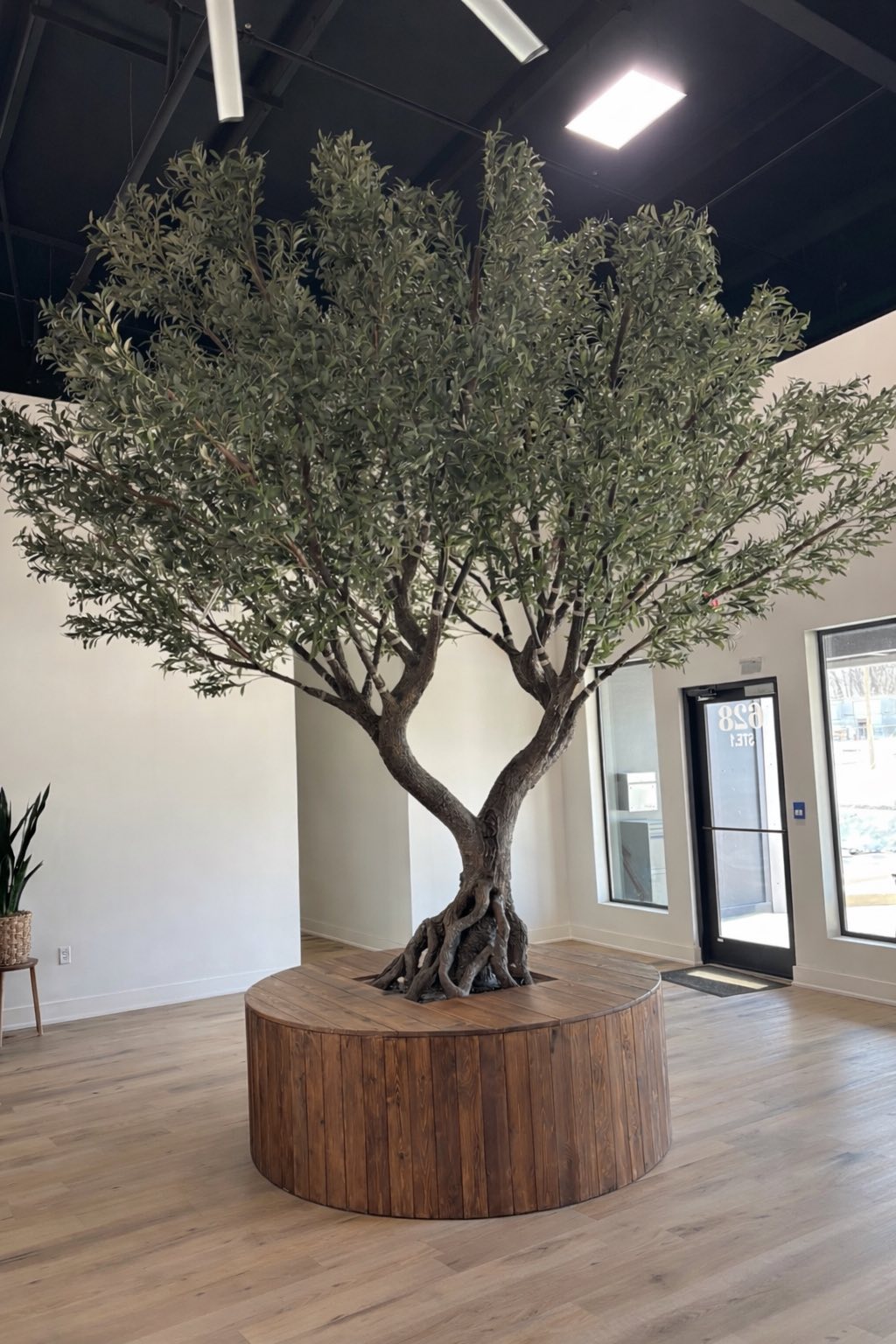 After — Installed centerpiece with faux olive tree