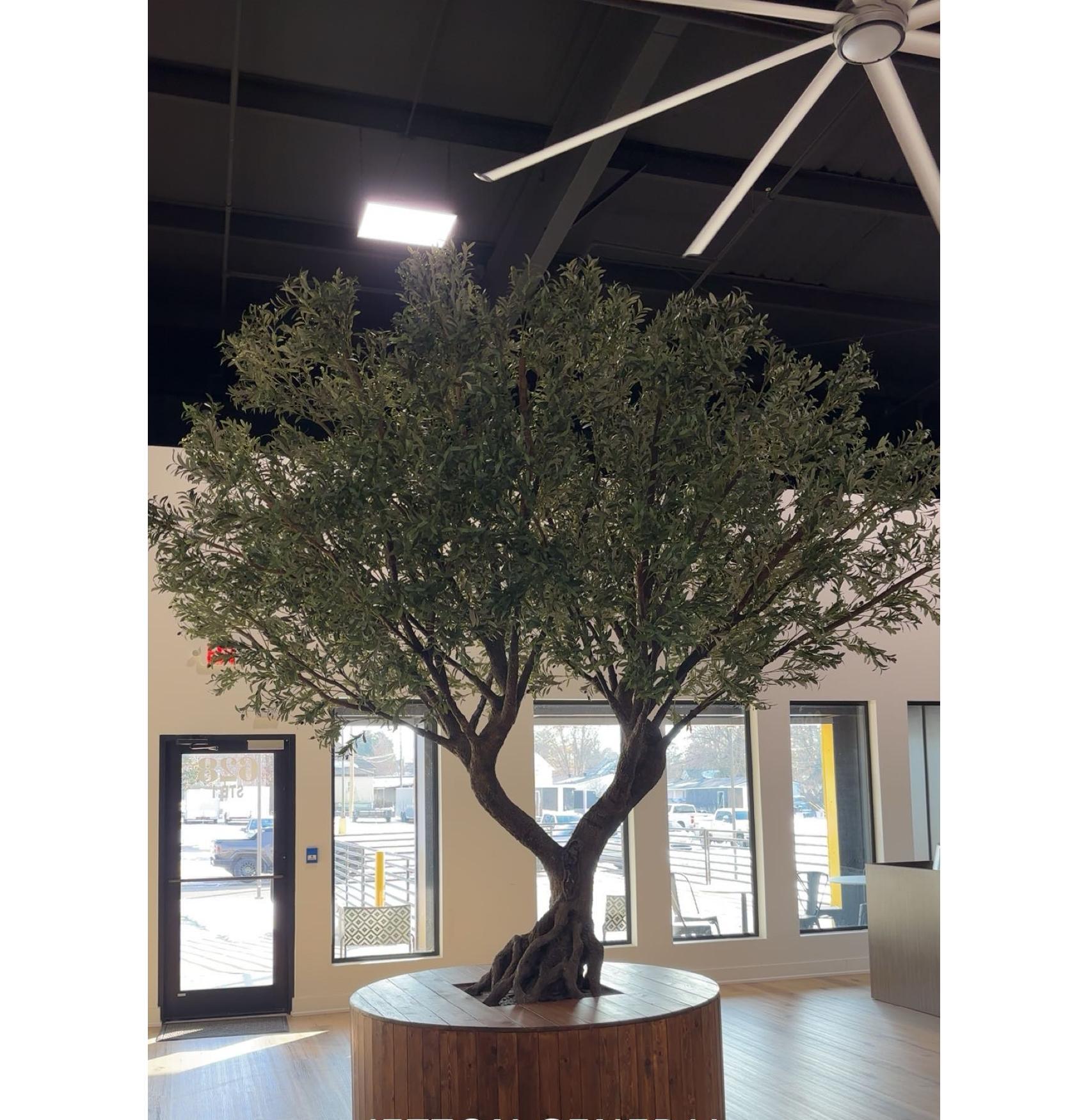 After — Installed centerpiece with faux olive tree